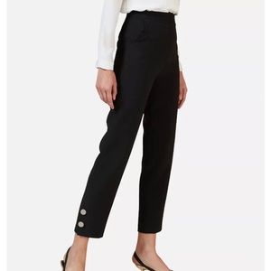 Pants with buttons on side